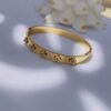Studded clover bracelet