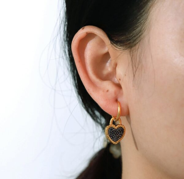 Black heart studded earrings