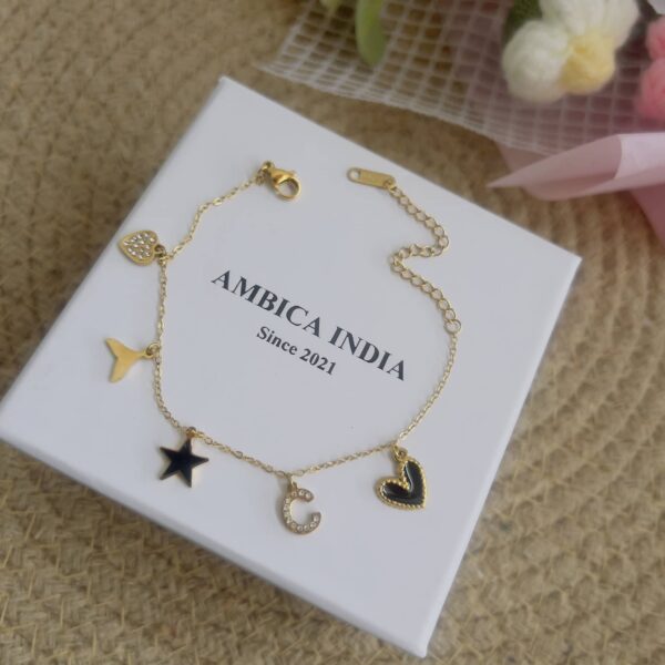 Black star with charm bracelet